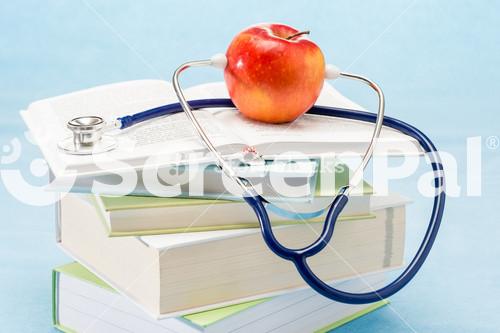 Stethoscope And Apple Medical Healthcare Healthy Lifestyle Doctor Book